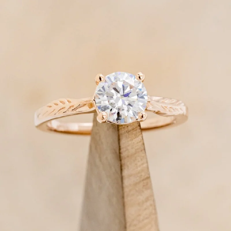 "HOPE" - ROUND CUT MOISSANITE SOLITAIRE ENGAGEMENT RING WITH FEATHER ACCENTS