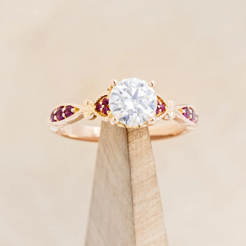 ROUND CUT MOISSANITE ENGAGEMENT RING WITH GENUINE RUBY HEART ACCENTS