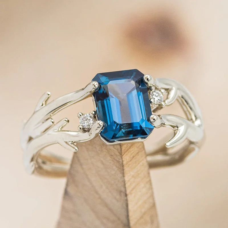 "ARTEMIS" - EMERALD CUT LONDON BLUE TOPAZ ENGAGEMENT RING WITH DIAMOND ACCENTS